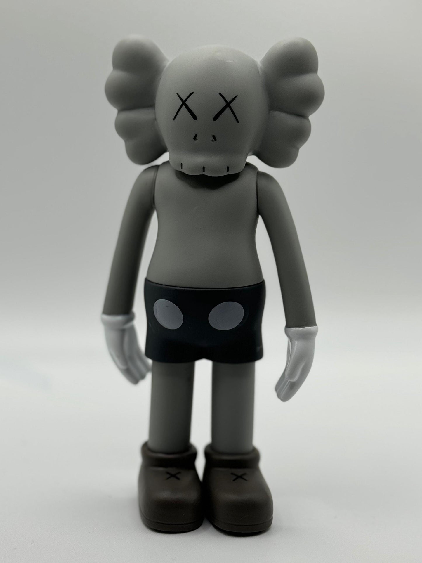 KAWS - Kaws Figures, Standing, Sitting, Laying and Crying Sculpture 7in